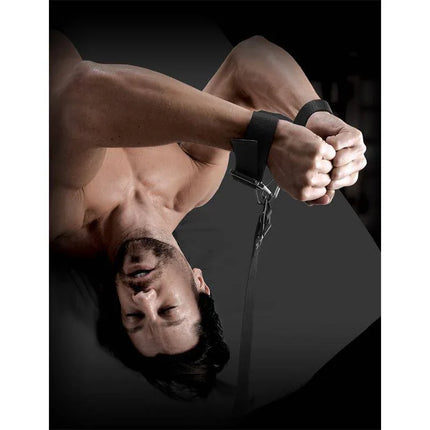 Under-Mattress Bondage Straps in use with heavy-duty cuffs for secure and adjustable fit.