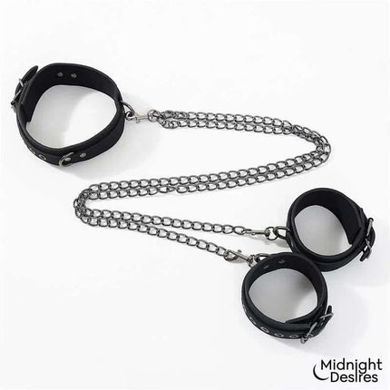 Midnight Desires Collar and Ankle Cuffs with Chain in vegan leather, featuring adjustable buckles and detachable chain for adults.