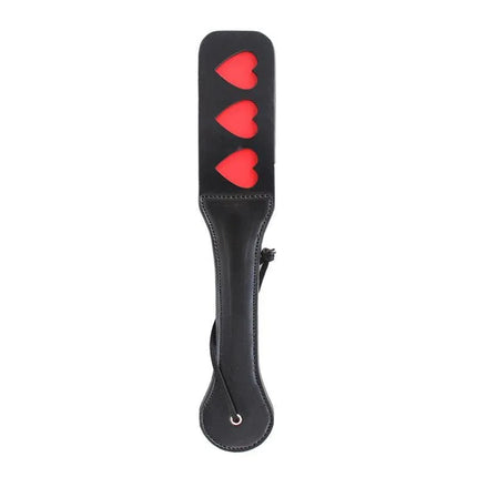 Vegan Leather Paddle with Hearts 32 cm featuring heart cutouts, perfect for couples seeking a cruelty-free and luxurious experience.