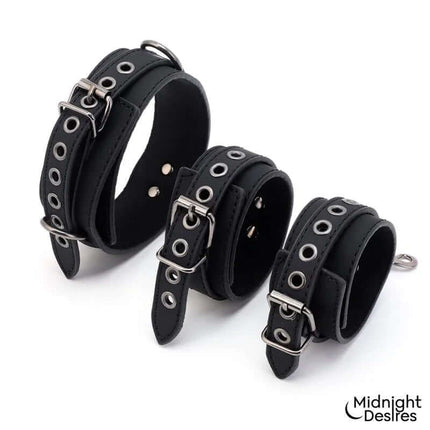 Restriction Set with Collar and Cuffs made of vegan leather for consensual restraint by Midnight Desires.