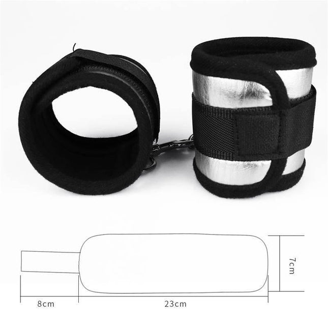 Velcro Handcuffs Black and Silver with neoprene and cotton design for comfort and gentle restraint, featuring dimensions 23 cm x 7 cm.