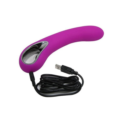 Vibe Elmer Pink vibrator with USB cable, featuring 12 vibration functions for versatile adult stimulation, rechargeable and user-friendly.