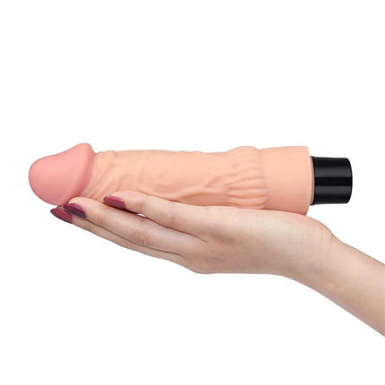 Vibe Real Softee 7.8 Flesh realistic vibrator in hand – lifelike flesh tone dildo from secretsextoys.store