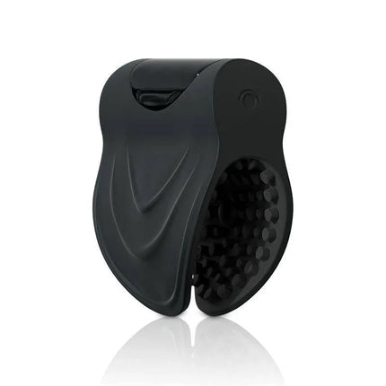 Vibrating Masturbator Edger in black, showcasing its compact design and textured surface for customizable stimulation.