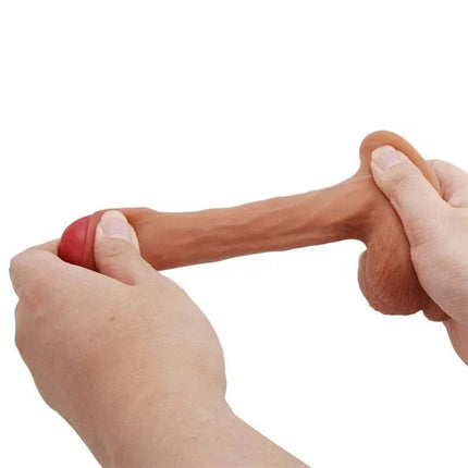 Hands stretching the Warnell Realistic Dildo showcasing its lifelike texture and flexible TPR material.