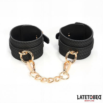 Weaving Patterns Ankle Cuff Golden Chain by Latetobed, black PU cuffs with gold-colored metal chain for luxury BDSM play.