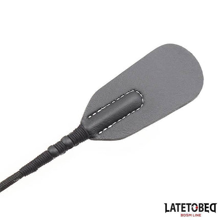 Whip with Braided Handle 44.5cm, sleek black finish and durable design for collectors and performers seeking controlled handling.