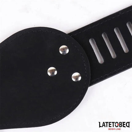 Close-up of Womens Chastity Belt Adjustable One Size in black with adjustable strap and metal studs.