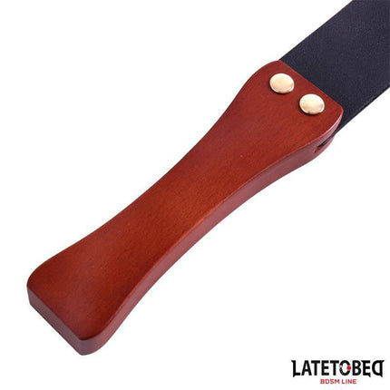 Wooden handle paddle 47 cm from Latetobed BDSM Line featuring a solid wood core with PU surface, ideal for intense sensations and control.
