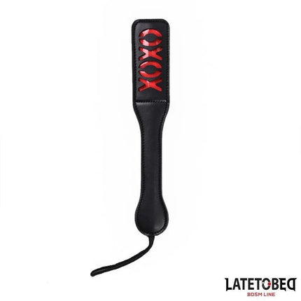XOXO Paddle 32cm in black and red, a BDSM tool designed for consensual play, showcasing a bold and expressive aesthetic.