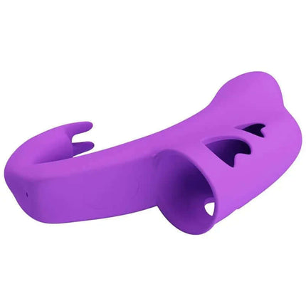Purple Yenna Fingering Vibrator resting on surface, designed for precise fingertip stimulation, made of high-quality silicone.