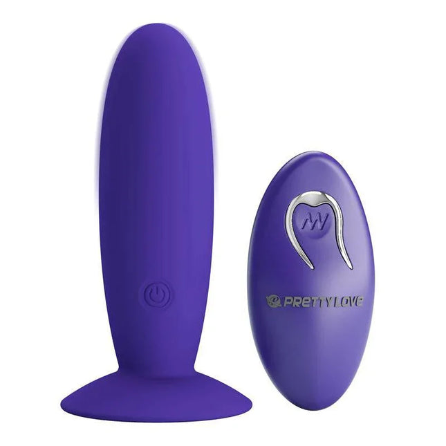 Youth Vibrating Anal Plug with Remote featuring a thick shaft, tapered tip, and suction base for hands-free use.